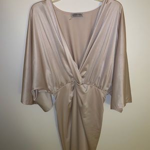 A silk dress, very beautiful and never worn